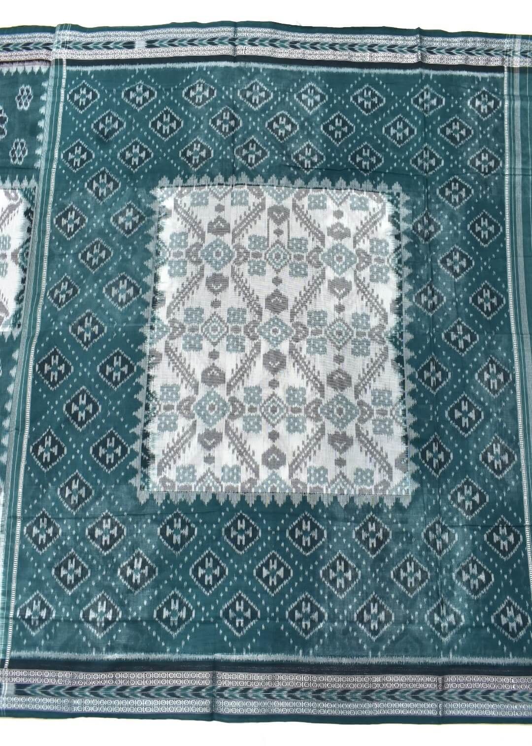 WhatsApp Image 2026-05-18 at 6.49.50 PM (1) Elegant Teal & White Handwoven Ikat Saree – Traditional Ethnic Wear for Women - Image 1